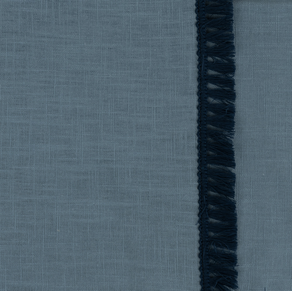 Tovagliolo in lino color jeans con frange blu